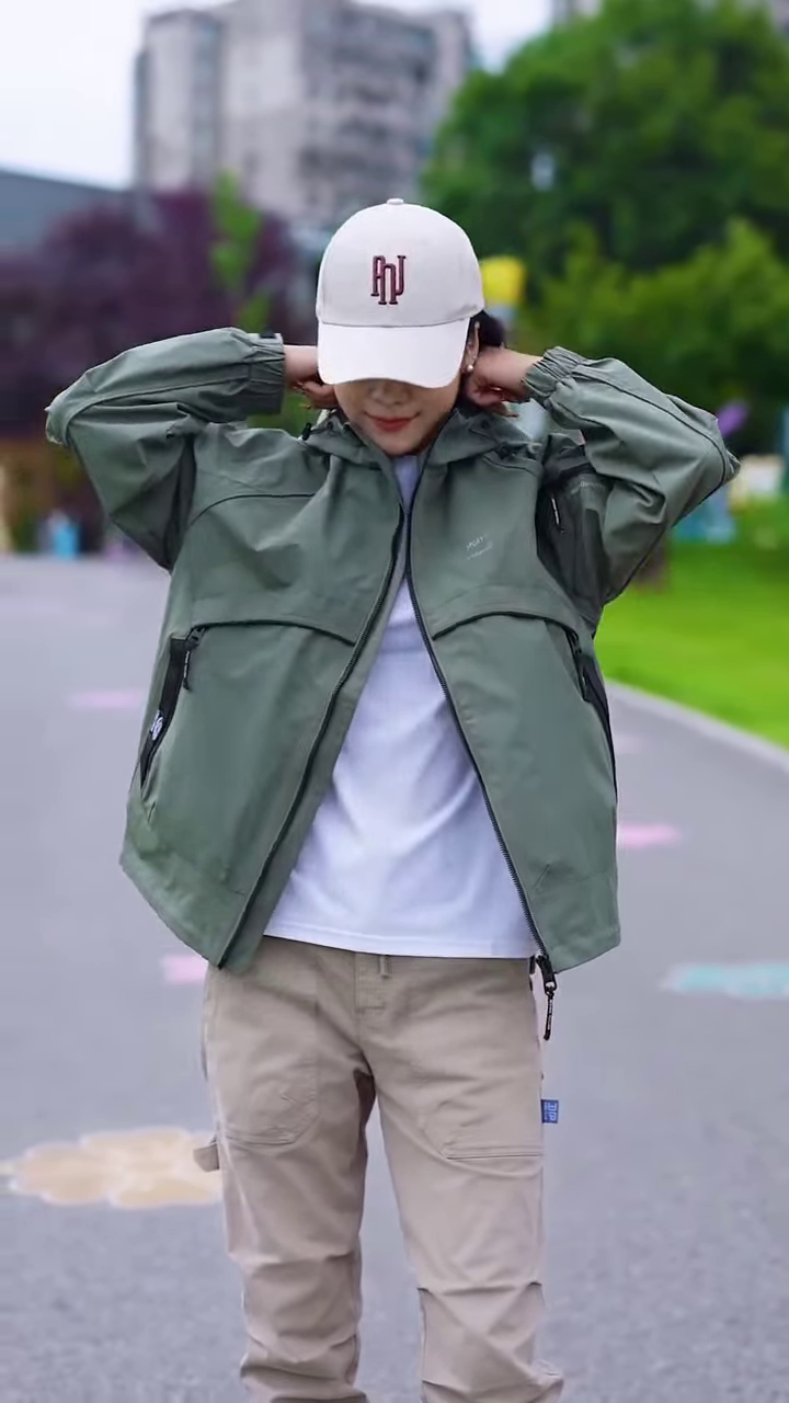 Green Zip-Up Casual Jacket π§₯π³ β Styled with White Tee & Beige Cargo Pants in Outdoor Setting - Image 4