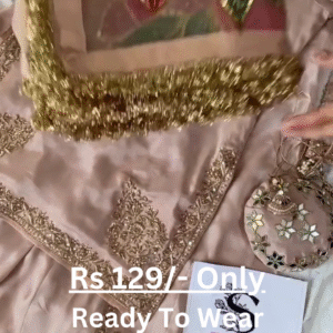 Rose Gold Splendor: Embroidered Silk Suit with Potli Bag
